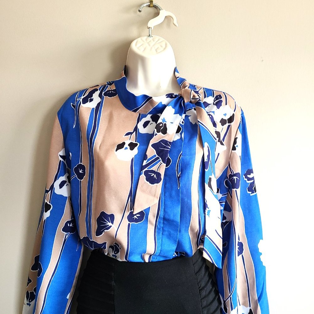 Vintage Koret long sleeves blouse with off center buttons down and bow.